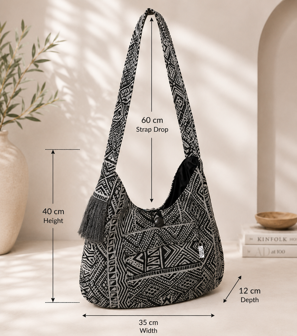 Black and white patterned bag with measurements on a light background