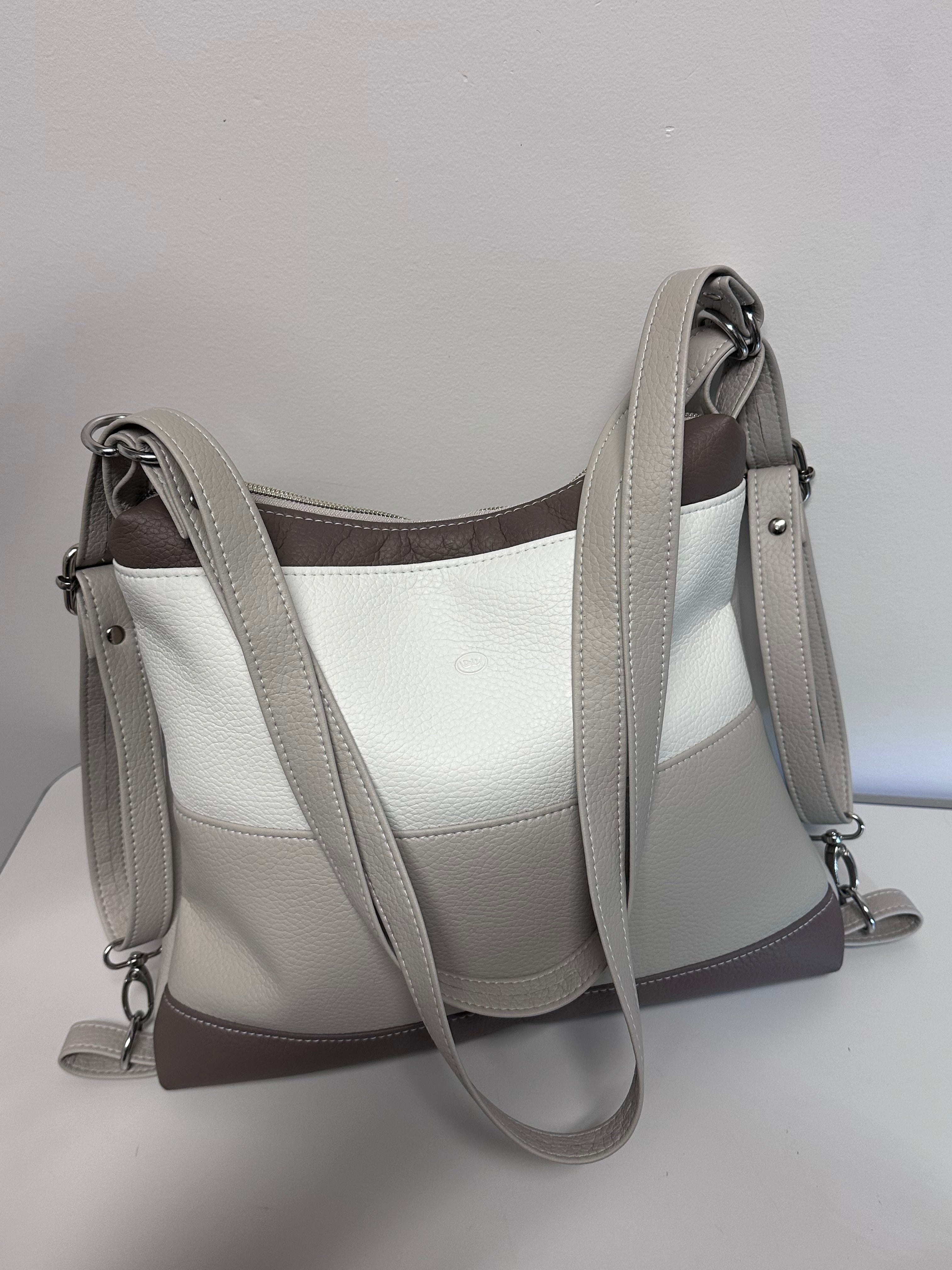 Gray handbag with a strap on a light gray background