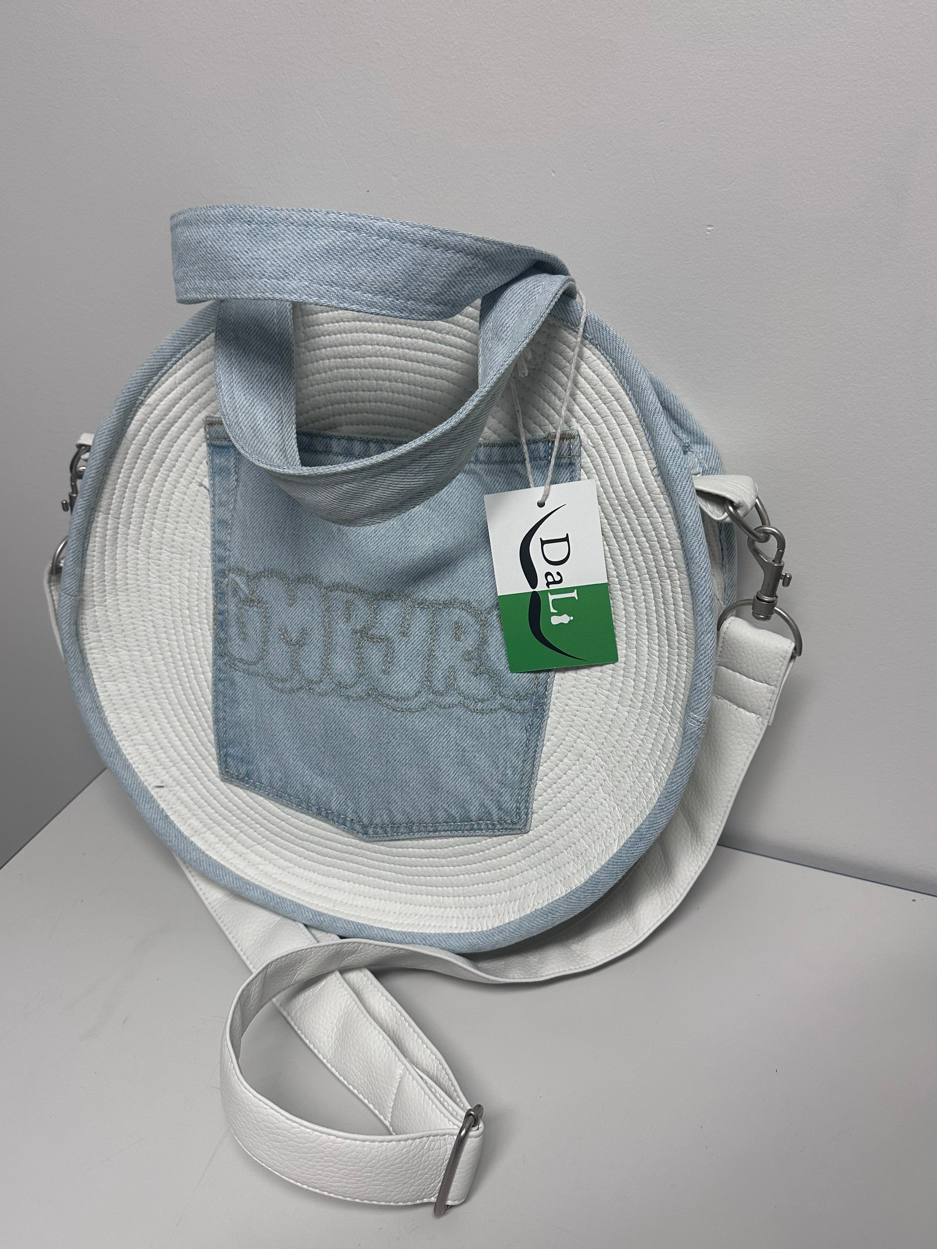 Handmade denim bag with a strap and Dali logo tag