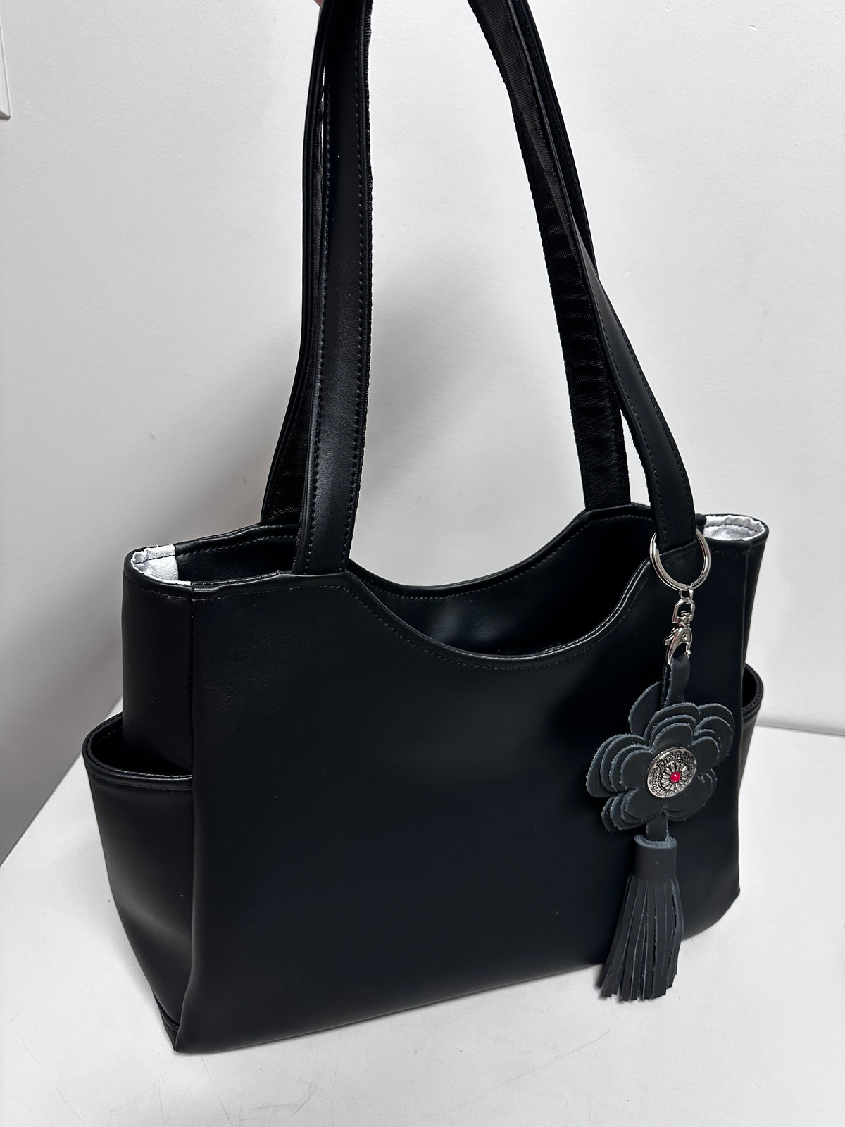 Black Faux Leather Tote Bag with Leather Flower & Tassel Charm