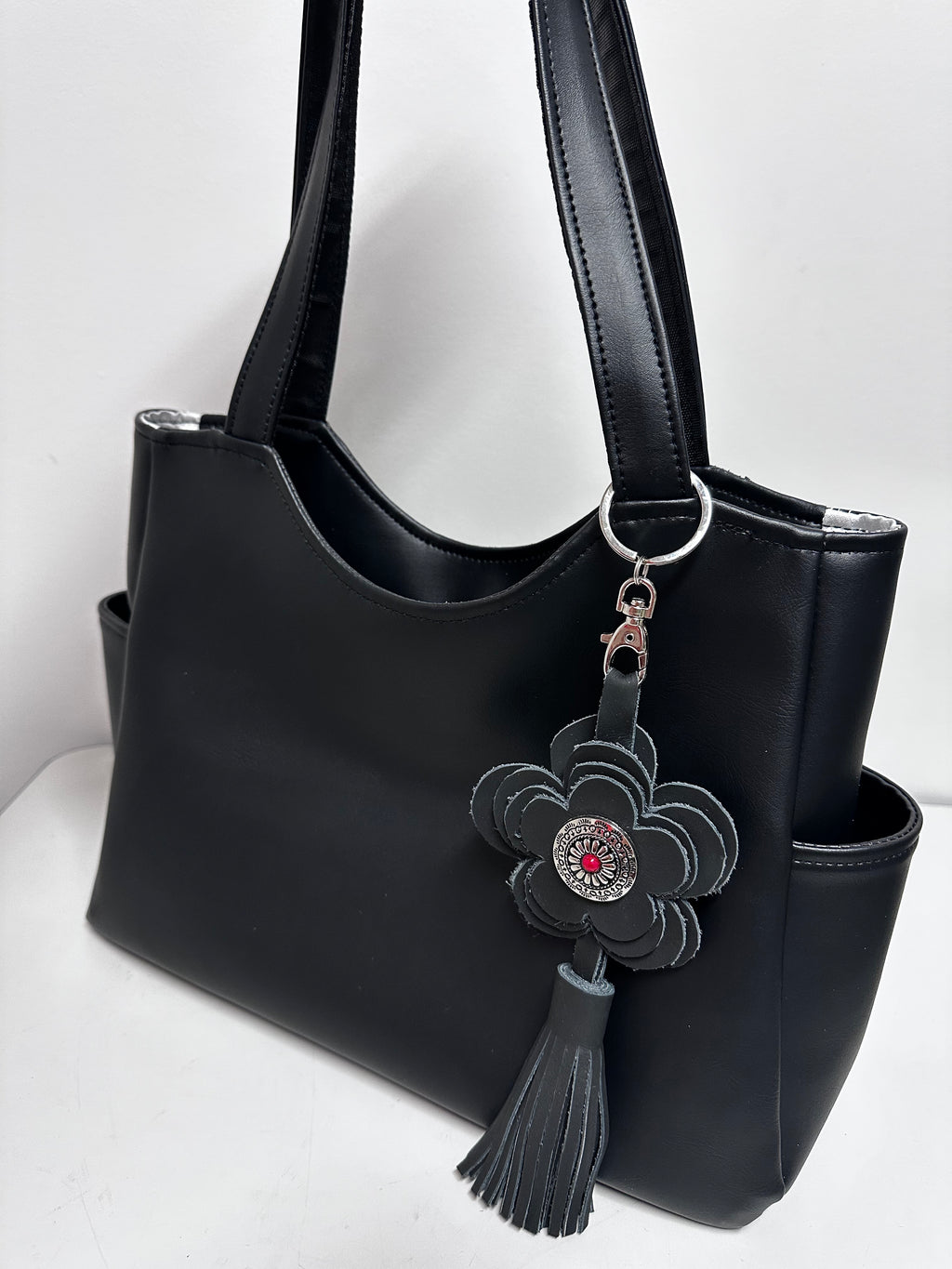 Black Faux Leather Tote Bag with Leather Flower & Tassel Charm