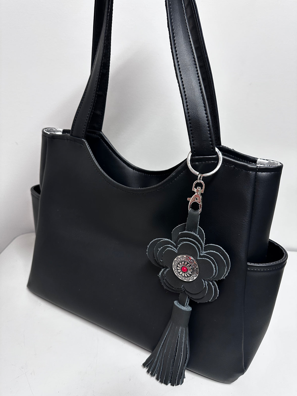 Black Faux Leather Tote Bag with Leather Flower & Tassel Charm
